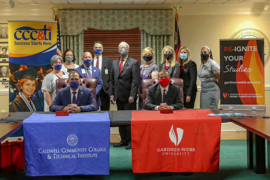 Presidents of CCC&TI and Gardner-Webb sign transfer agreements.