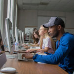 students on laptops