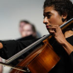 Mackenzie Quattlebaum plays the cello during a past performance of the GWU orchestra.