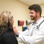 Adamn Benfield with patient