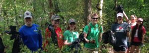 students hiking in woods