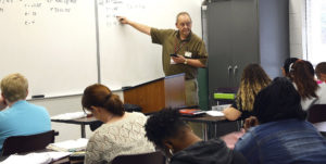 Kevin Parsons teaching a class mathematics