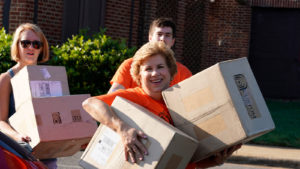 Mrs. Downs moving boxes