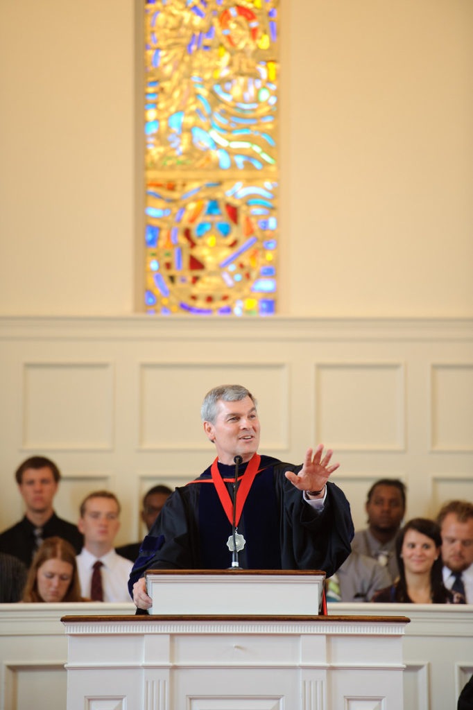 Dr. Robert Canoy speaks in the Dover Chapel during a service before Covid-19.