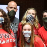 a phot of emily mosier and her family on move-in day