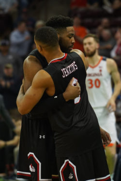 players hugging after a victory