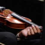 A close up photo of a violin
