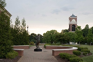 Aurora Statues with a view of the clock tower