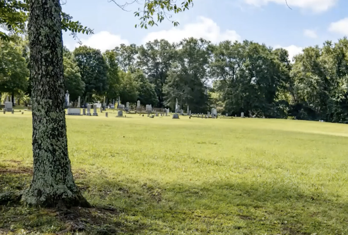 A photo showing an empty area in Sunset Cemetery where the bodies of enslaved people are believed to be buried.