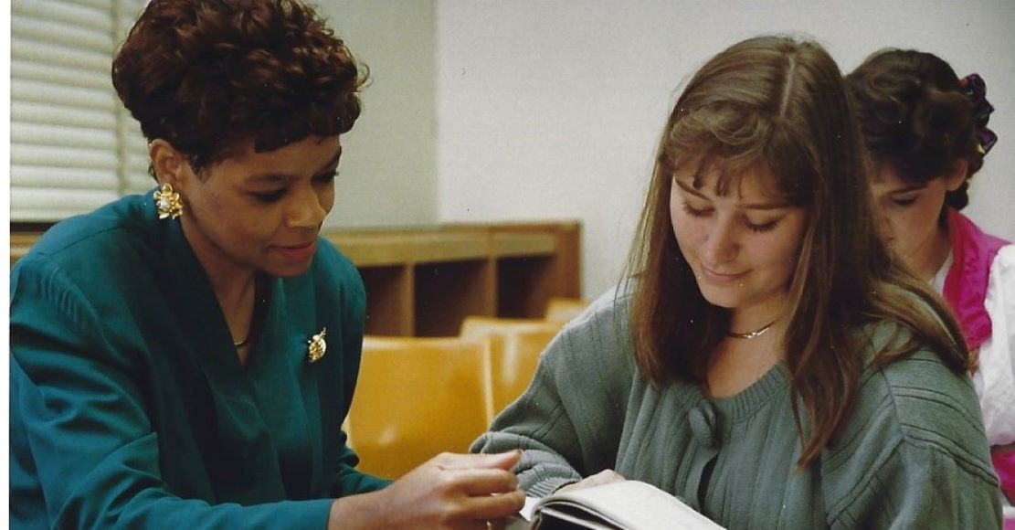 Cindy McKinney in class with a student