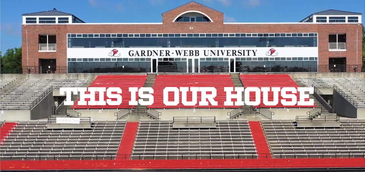 A screenshot of the video, with the title This is Our House printed over a picture of Spangler Stadium
