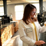 Female student in lab count in chemistry lab