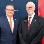 Davidson-Davie’s Dr. Darrin Hartness, left, and Gardner-Webb’s Dr. Ben Leslie following the signing.