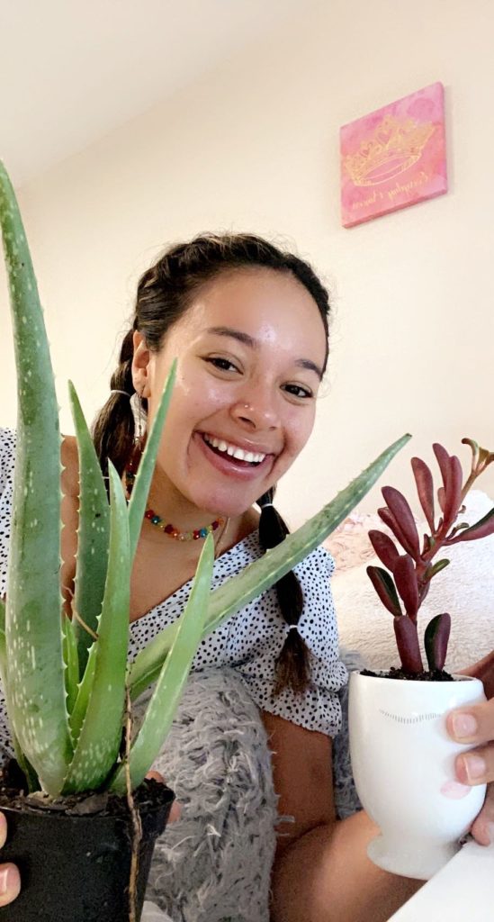 Jenni Escalera with her aloe and succulent plants
