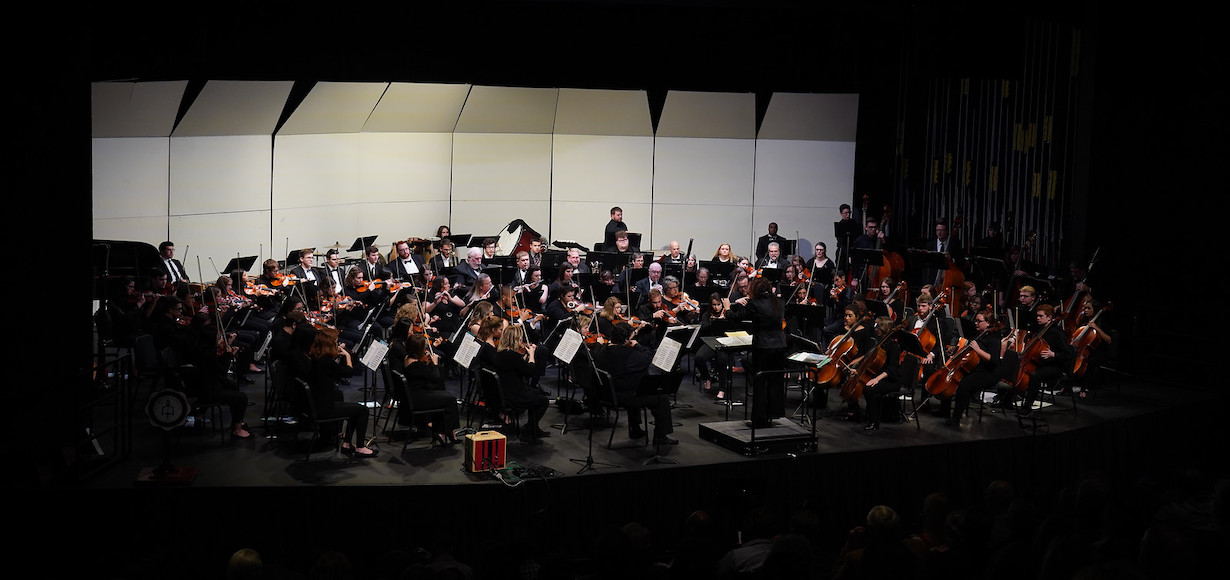 a photo of the GWU orchestra on stage