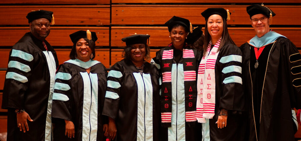 Dr. Kim Williams-Roberts, second from right, poses with four others in the Doctor of Education in Organizational Leadership cohort at Gardner-Webb University's Commencement in December 2021. Dr. Jeff Hamilton, right is the program coordinator.