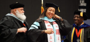 Dr. Kim Williams-Roberts receives her hood at the December 2021 Graduation Ceremonies.