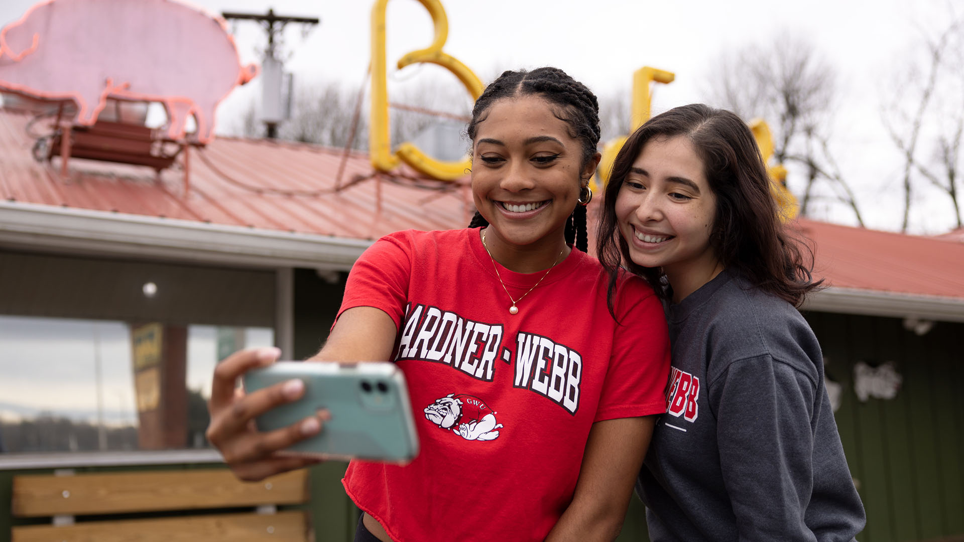 Two female students at Bridges Barbecue in Shelby NC