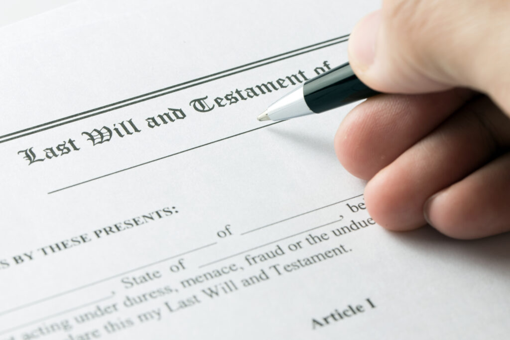 hand signing last will and testament