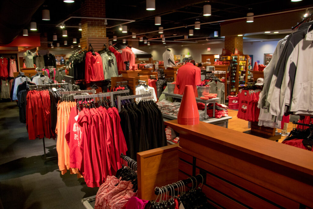 A shot of the interior of the campus shop with displays of shirts and other GWU swag