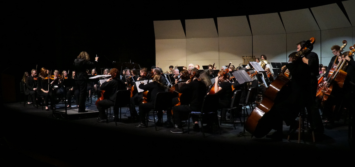 The GWU Orchestra on stage during a concert