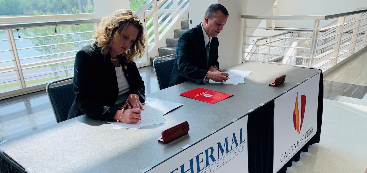 Dr. Margaret Annunziata, president of Isothermal Community College (left), and Dr. William Downs, president of Gardner-Webb University, signed several agreements that build stronger pathways for students between the two institutions this week.