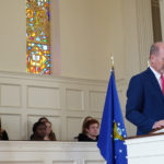 Tracy Jessup leads in prayer at the University's Veteran's Day Service in 2021