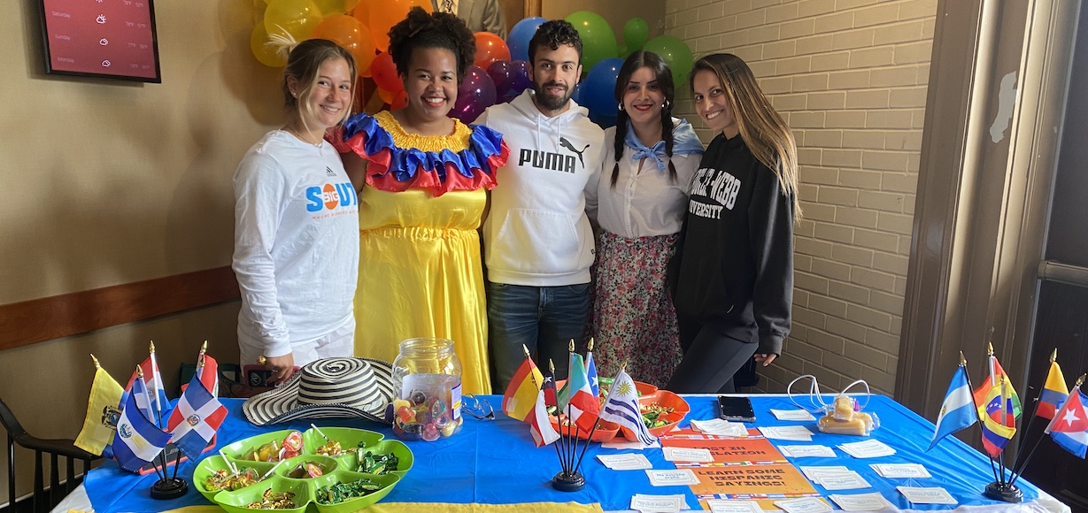 Eloisa Sofia Puello Cabeza, second from left, poses with other International students during a Spanish Language Day celebration held during the Spring 2022 semester. From left are, Elise Semmartin, tennis player, undergrad student from France; Felipe Vélez, soccer team, grad student from Colombia; Lucía Berberena, 2021-2022 Spanish TA, from Uruguay; and Daniela Naupari, tennis alum, from Perú.