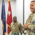 The South Carolina National Guard held a changing of the stole ceremony at the Adjutant General Complex auditorium, Columbia, South Carolina, July 9, 2022. U.S. Army Chaplain (Col.) Norris Darden, Jr., South Carolina National Guard senior state chaplain, passed the stole to incoming chaplain, U.S. Army Chaplain (Lt. Col.) James Davidson, South Carolina National Guard. The transferring of the stole is similar to the passing of a unit's guidon during a change of command ceremony. The changing of the stole demonstrates the responsibility for spiritual leadership and pastoral care passing from one chaplain to another. (U.S. Army National Guard photo by Staff Sgt. Brian Calhoun, South Carolina National Guard)
