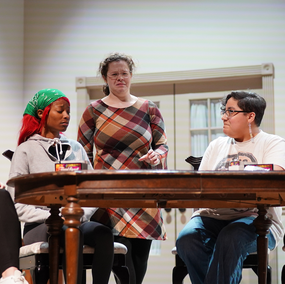 From left, Aliyah Eugene as Renee, Raleigh Wallace as Florence Ungar and Mia Cotty as Mickey rehearse a scene from “The Odd Couple (Female Version).”