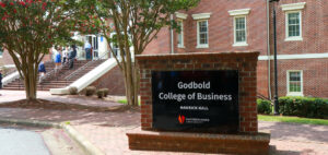 a photo of the Godbold College of Business sign in front of Hamrick Hall