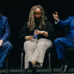 Guests for the Department of Communication, Art and Design Professional Takeover Day included, from left, Noel Manning, GWU associate vice president for Communications and Marketing, Alexis Mitchell, senior social media and community manager for Families Against Mandatory Minimum, and Reginald Walker Jr., a producer for Sports Business Journal in Charlotte, N.C. Photo by Shira Edwards / GWU Photo Staff