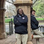 Four members of the Ethics Bowl Team pose