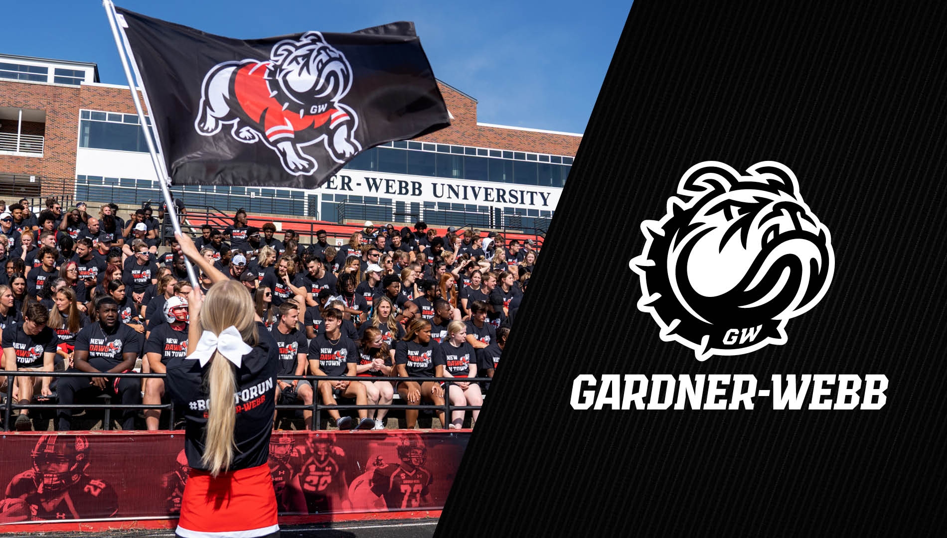 banner with cheerleader waving bulldog flag in front of crowd