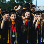 A group of graduates celebrate