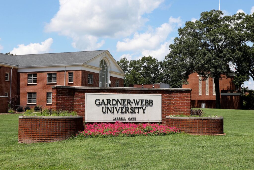 A photo of the Jarrell Gate with flowers