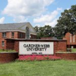 A photo of the Jarrell Gate with flowers