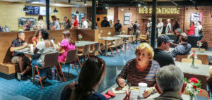 Diners enjoy samples in the new Bo's Smokehouse