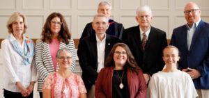 The Gardner-Webb School of Divinity Fall Convocation welcomed leaders of the Charles B. Keesee Fund. The Keesee Fund has supported the divinity school since 2006 in various ways, including providing scholarships to students. This photo includes winners of the Vernie W. Lewis Scholarship, which was established in 2021. Front row, from left, are Joy Axelsson, 2022 recipient; Lindsay Karback, this year’s recipient; and Avery Woods Young, 2021 recipient. The Keesee representatives on the back row, from left, are Trustee Martha Medley, Executive Director Sandra Prilliman, Trustee John Fulcher, Vice President and Trustee Douglas Ramsey, and President Ryan Hutchinson.
