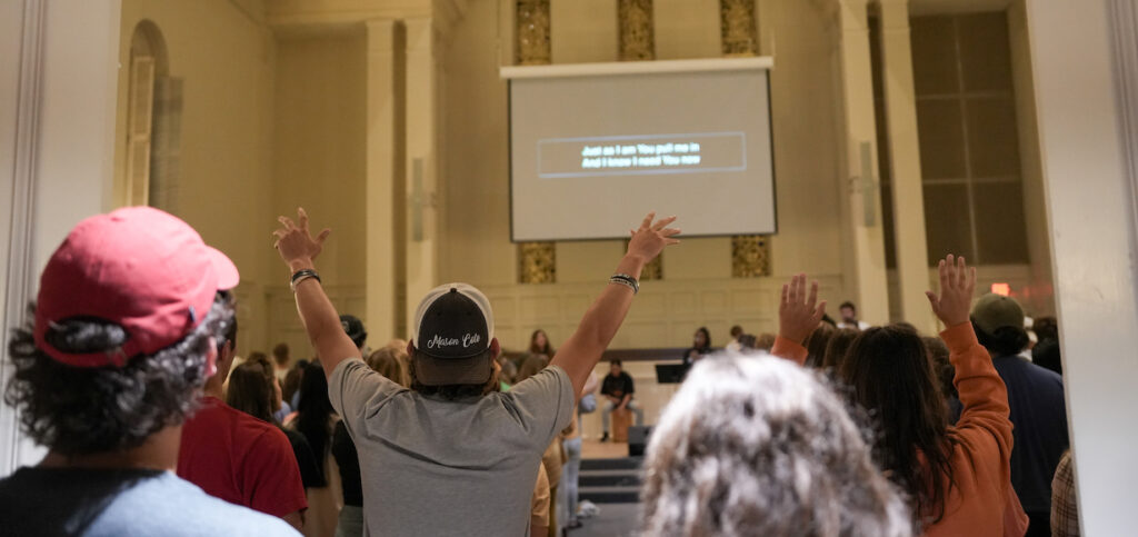 students worship at the gathering