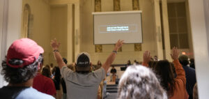 students worship at the gathering