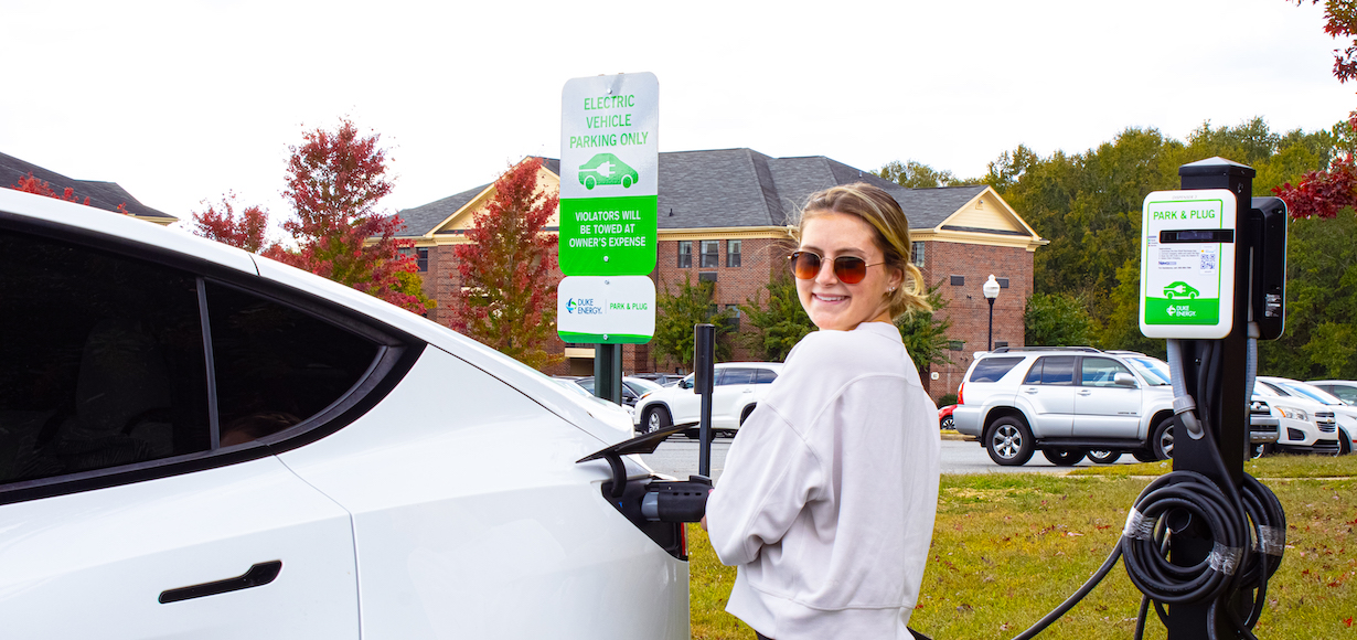 Avery Callan, a junior bio-med major, appreciates the convenience of having Electric Vehicle Charging Stations on campus.