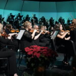 The stage in Dover Theater with the choir and orchestra.