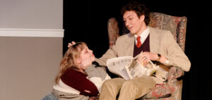 Female and male student rehearse a scene from the play, Sylvia