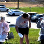 volunteers take a pie in the face