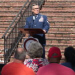 The audience listens to the speaker for memorial day