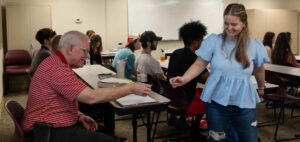 Dr. James Morgan and a student in his class