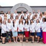 PA studies class of 2024 poses for a photo after receiving their white coats