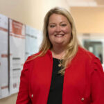 Anna Hamrick in the hallway of the College of Arts and Sciences