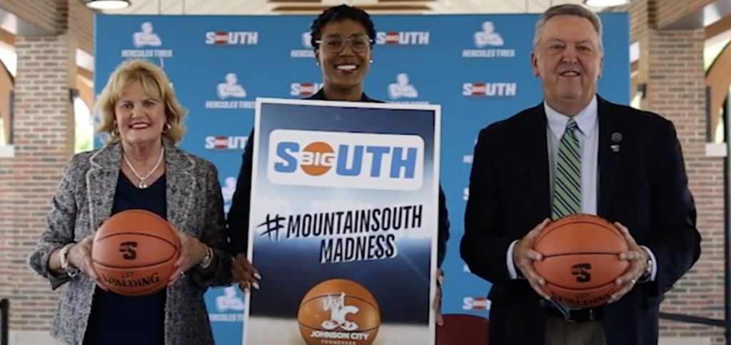 Representatives of Johnson City pose with Big South Commissioner Montgomery